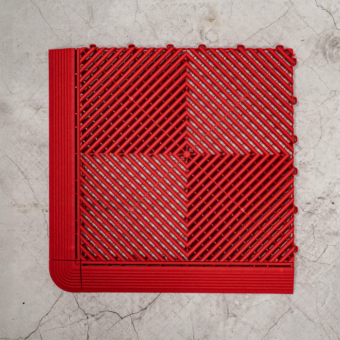 Swisstrax Ribtrax Pro Racing Red Tile with ramps and a corner attached