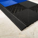 Connected Jet Black and Royal Blue Swisstrax tiles with connecting Jet Black ramp sections